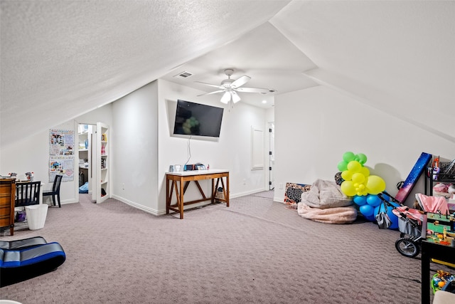 7905 Strathmill Dr, The Colony, TX 75056 - playroom with vaulted ceiling, carpet, baseboards, and ceiling fan