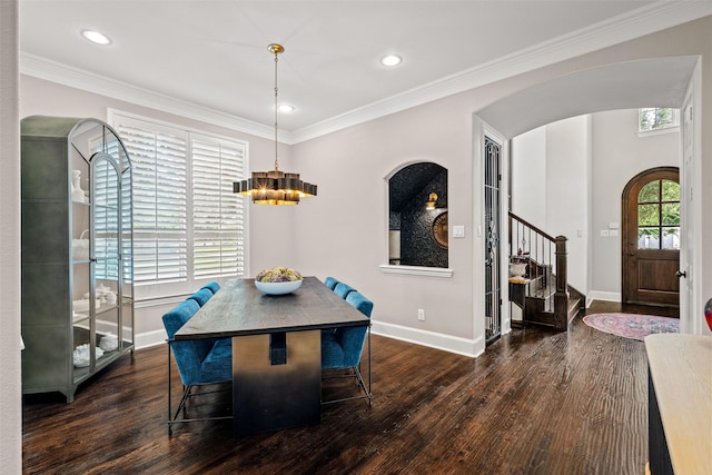 7905 Strathmill Dr, The Colony, TX 75056 - dining area featuring arched walkways, stairway, baseboards, a chandelier, and wood finished floors