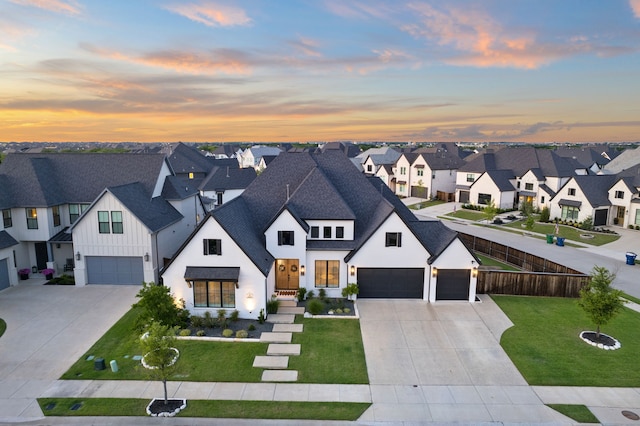 1619 Sterling Ct, Celina, TX 75009 - modern inspired farmhouse with driveway, an attached garage, and a residential view