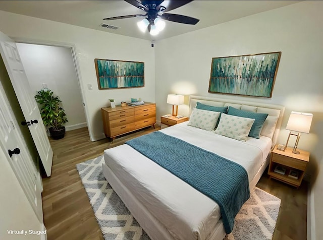 126 Stephens St, Waxahachie, TX 75165 - bedroom featuring wood finished floors, baseboards, and a ceiling fan