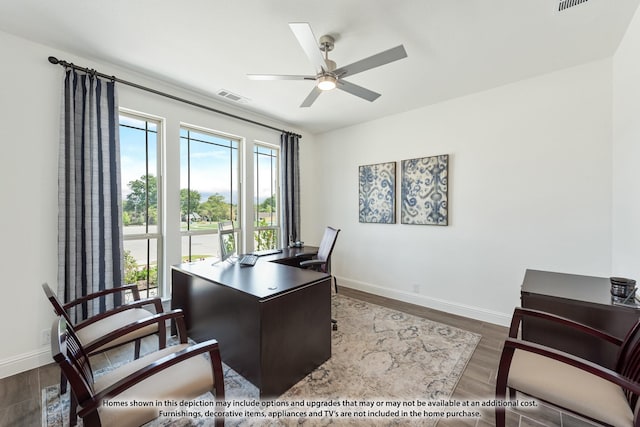 3418 Abingdon Dr, Melissa, TX 75454 - home office with healthy amount of natural light, dark wood-type flooring, and baseboards