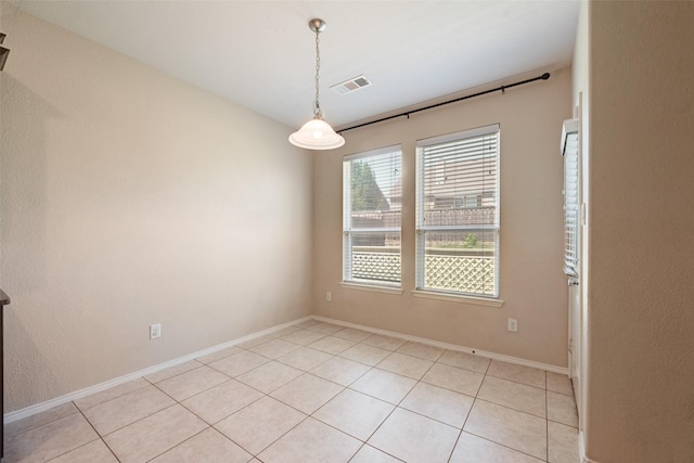 1503 E Collins Blvd, Wylie, TX 75098 - spare room with light tile patterned floors and baseboards