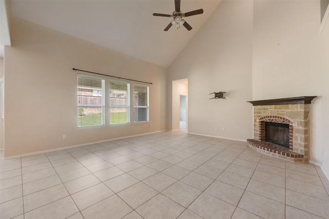 1503 E Collins Blvd, Wylie, TX 75098 - unfurnished living room featuring high vaulted ceiling, a ceiling fan, light tile patterned flooring, a fireplace, and baseboards