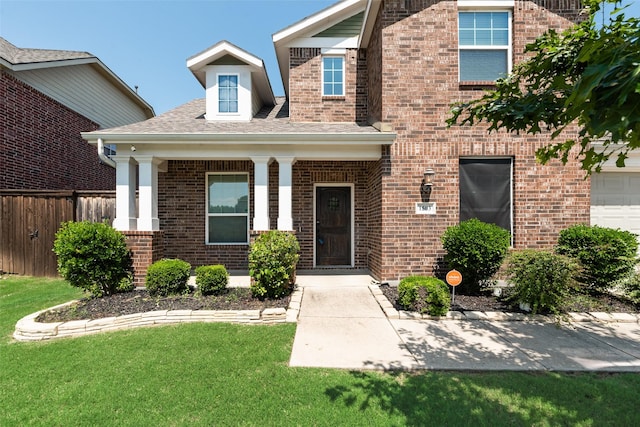 1503 E Collins Blvd, Wylie, TX 75098 - view of front of house with brick siding and a shingled roof