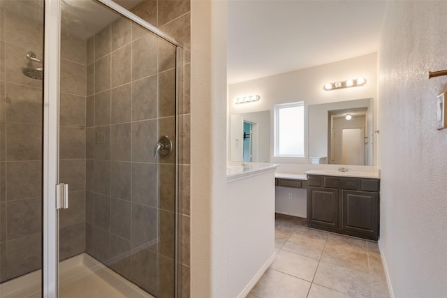 1503 E Collins Blvd, Wylie, TX 75098 - full bath featuring a shower stall, vanity, tile patterned floors, and baseboards