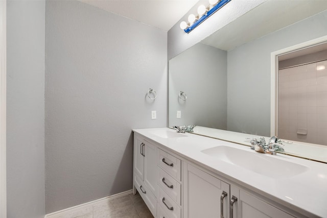 1503 E Collins Blvd, Wylie, TX 75098 - full bath with double vanity, baseboards, and tile patterned flooring