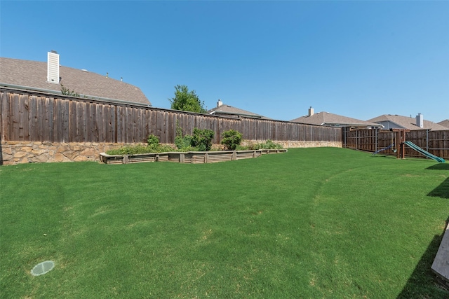 1503 E Collins Blvd, Wylie, TX 75098 - view of yard with a playground