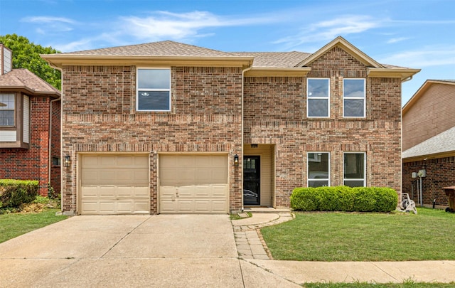 783 Eiffel Dr, Plano, TX 75023 - view of front facade with concrete driveway, brick siding, an attached garage, and a front lawn