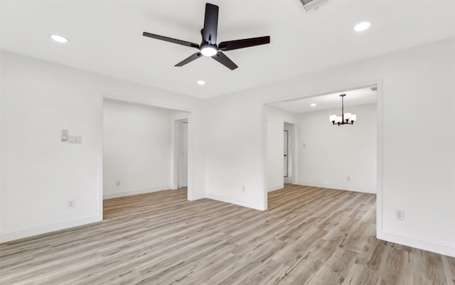 783 Eiffel Dr, Plano, TX 75023 - unfurnished room with recessed lighting, light wood-style flooring, a chandelier, a ceiling fan, and baseboards