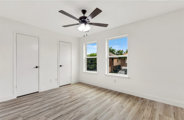 783 Eiffel Dr, Plano, TX 75023 - unfurnished bedroom with light wood finished floors, baseboards, and ceiling fan