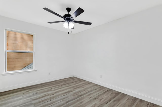 783 Eiffel Dr, Plano, TX 75023 - empty room with baseboards and wood finished floors