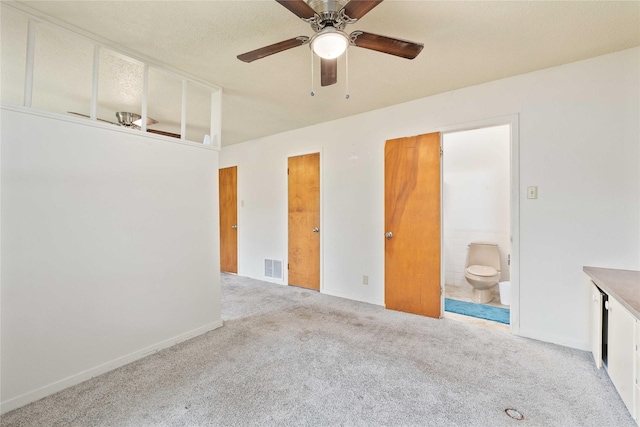 201 Palestine St, Coleman, TX 76834 - carpeted spare room featuring ceiling fan
