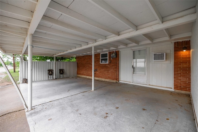 201 Palestine St, Coleman, TX 76834 - view of patio / terrace featuring an attached carport and a wall mounted AC