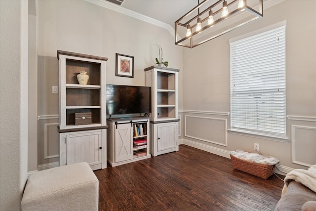3302 Blue Jay Ln, Melissa, TX 75454 - living room with crown molding, dark wood finished floors, and wainscoting