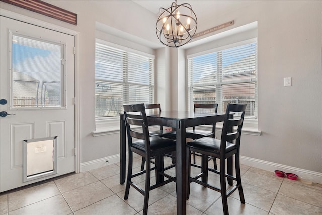 3302 Blue Jay Ln, Melissa, TX 75454 - dining area with a chandelier, light tile patterned flooring, and baseboards