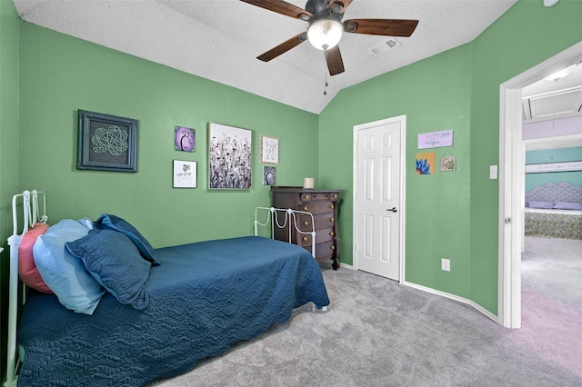 1908 Timberline Ln, Sherman, TX 75092 - bedroom featuring attic access, lofted ceiling, carpet floors, a ceiling fan, and baseboards