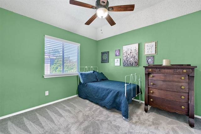 1908 Timberline Ln, Sherman, TX 75092 - bedroom with carpet floors, a ceiling fan, a textured ceiling, baseboards, and lofted ceiling