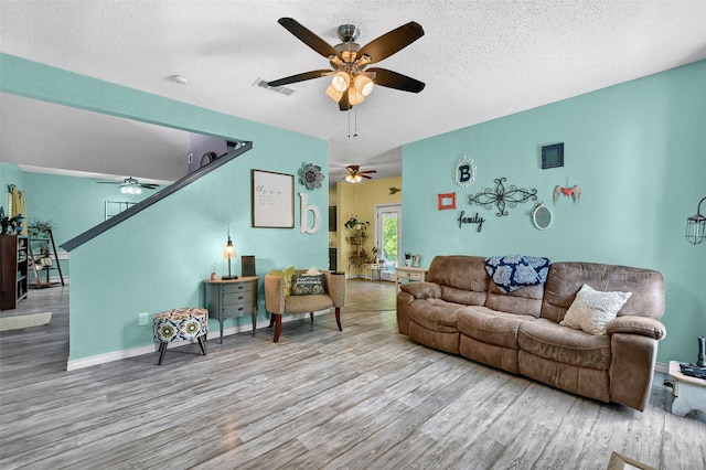 1908 Timberline Ln, Sherman, TX 75092 - living area with ceiling fan, wood finished floors, and a textured ceiling