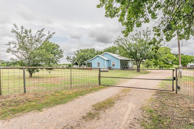 1503 County Road 705, Joshua, TX 76058 - view of dirt / gravel road featuring a gate and a gated entry