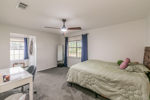 1503 County Road 705, Joshua, TX 76058 - bedroom with carpet flooring, baseboards, and ceiling fan