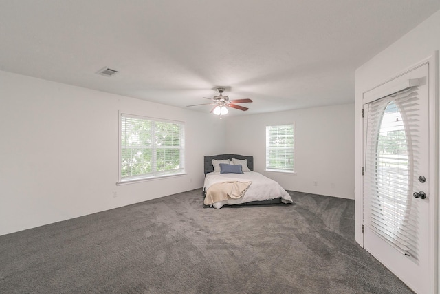 1503 County Road 705, Joshua, TX 76058 - carpeted bedroom featuring a ceiling fan