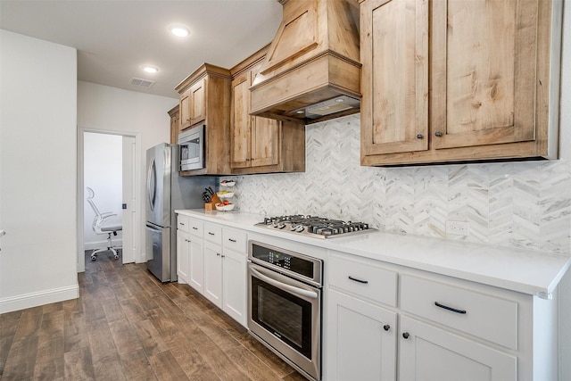 9925 Chaparral Pass, Fort Worth, TX 76126 - kitchen featuring appliances with stainless steel finishes, custom exhaust hood, decorative backsplash, light countertops, and dark wood-style floors