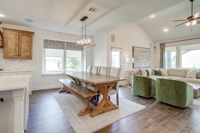 9925 Chaparral Pass, Fort Worth, TX 76126 - dining room featuring ceiling fan, dark wood-style flooring, vaulted ceiling, a chandelier, and baseboards