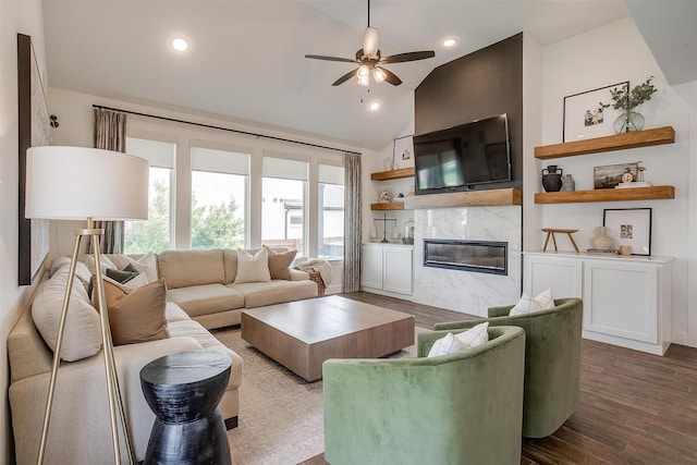 9925 Chaparral Pass, Fort Worth, TX 76126 - living area with lofted ceiling, a ceiling fan, dark wood-style floors, a fireplace, and plenty of natural light
