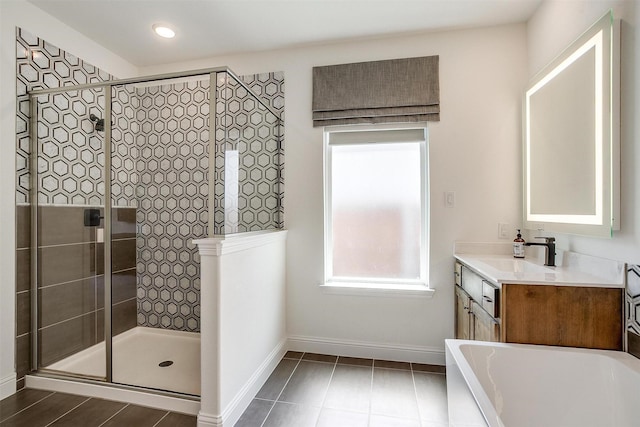 9925 Chaparral Pass, Fort Worth, TX 76126 - full bathroom with baseboards, vanity, a shower stall, and a bath