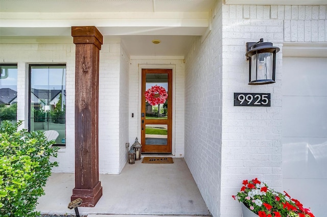 9925 Chaparral Pass, Fort Worth, TX 76126 - doorway to property featuring brick siding