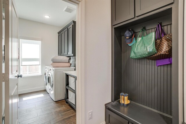 9925 Chaparral Pass, Fort Worth, TX 76126 - laundry area featuring baseboards, separate washer and dryer, cabinet space, and dark wood finished floors
