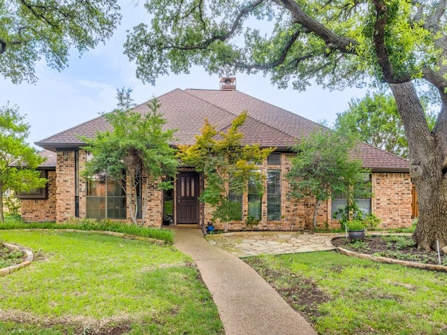 1504 Huron Trl, Plano, TX 75075 - single story home featuring a front lawn, brick siding, and a chimney