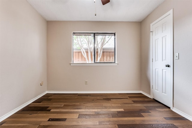 1504 Huron Trl, Plano, TX 75075 - unfurnished bedroom featuring wood finished floors, baseboards, and ceiling fan