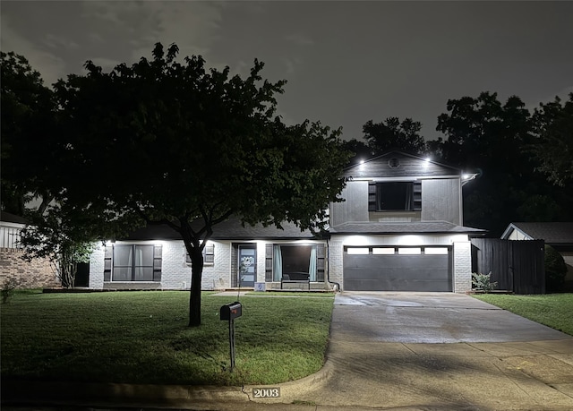 2003 Quincy Ct, Arlington, TX 76013 - traditional-style house featuring a garage, concrete driveway, a front lawn, and brick siding