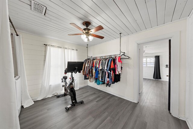 738 Randy Dr, Woodway, TX 76712 - exercise area featuring wood ceiling, ceiling fan, and wood finished floors