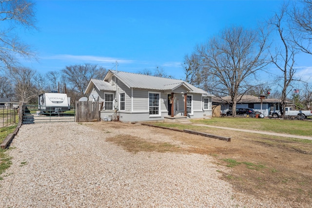 738 Randy Dr, Woodway, TX 76712 - ranch-style home featuring metal roof, driveway, and a gate