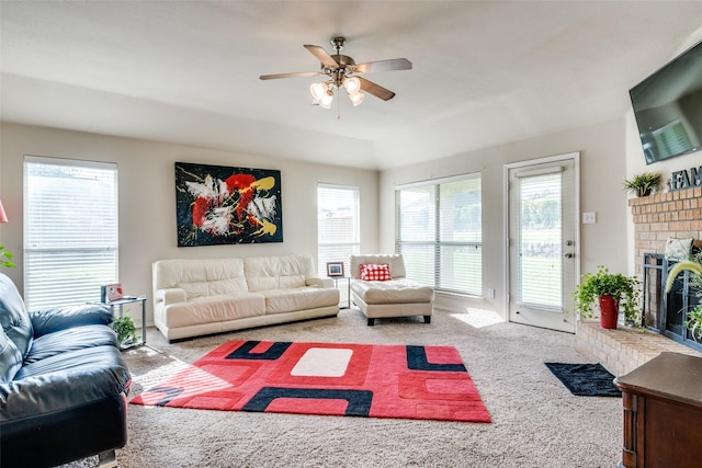2101 Thistle Ln, Forney, TX 75126 - living room with carpet floors, ceiling fan, and a fireplace
