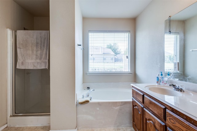 2101 Thistle Ln, Forney, TX 75126 - full bathroom with plenty of natural light, vanity, a bath, and an enclosed shower