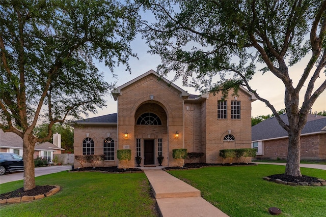 3659 Smoketree Dr, Rockwall, TX 75032 - view of front facade featuring brick siding and a front lawn