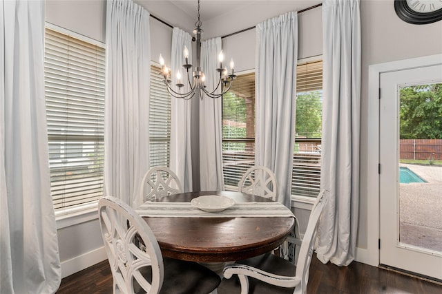 3659 Smoketree Dr, Rockwall, TX 75032 - dining space with a chandelier and dark wood-style floors