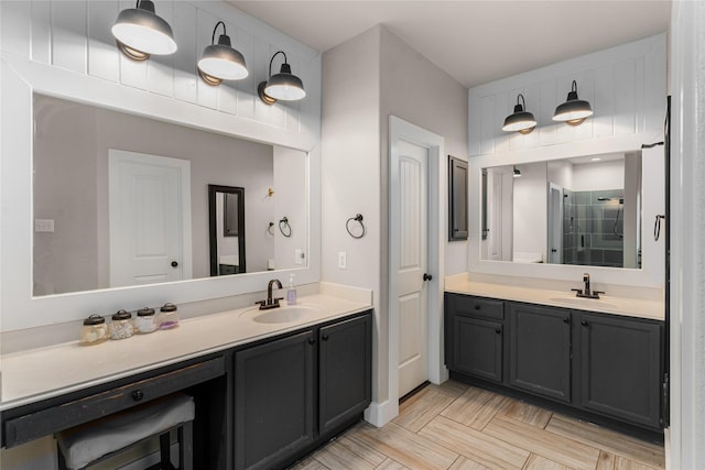 3659 Smoketree Dr, Rockwall, TX 75032 - bathroom featuring two vanities and a shower stall