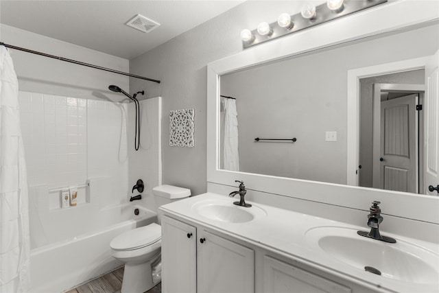 3659 Smoketree Dr, Rockwall, TX 75032 - full bath with shower / bathtub combination with curtain, double vanity, and wood finished floors