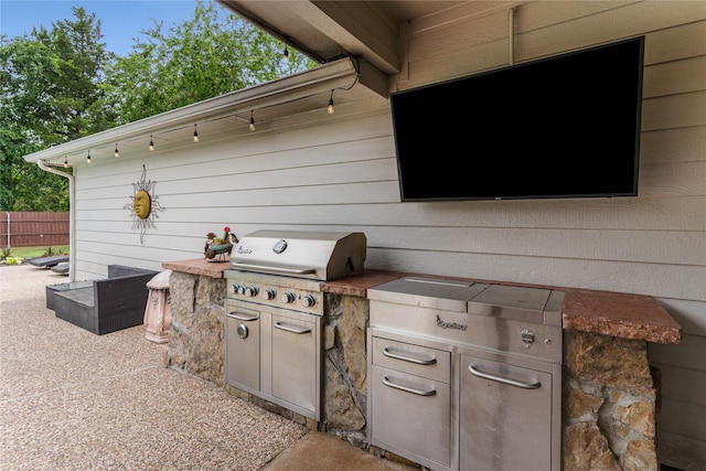 3659 Smoketree Dr, Rockwall, TX 75032 - view of patio with exterior kitchen