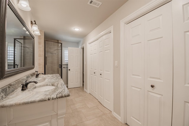3313 Country Club Rd, Pantego, TX 76013 - full bath with a closet, double vanity, and a tile shower