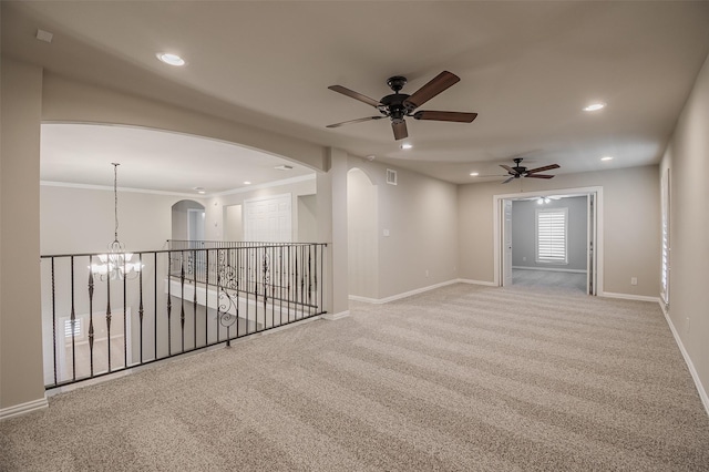 3313 Country Club Rd, Pantego, TX 76013 - carpeted spare room featuring a ceiling fan, recessed lighting, arched walkways, and a chandelier