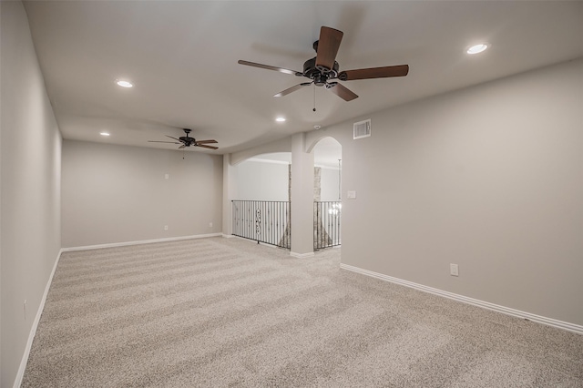 3313 Country Club Rd, Pantego, TX 76013 - unfurnished room with a ceiling fan, recessed lighting, arched walkways, and light carpet