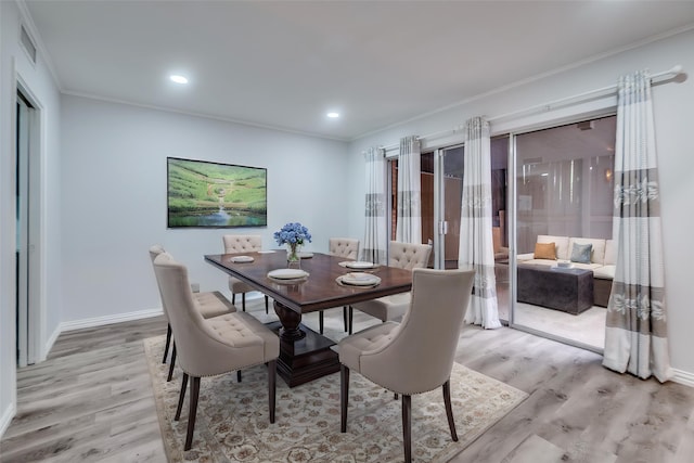 576 E Ave J Unit B, Grand Prairie, TX 75050 - dining area featuring light wood finished floors, crown molding, baseboards, and recessed lighting