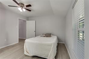 128 Stephens St, Waxahachie, TX 75165 - bedroom featuring wood finished floors, baseboards, and a ceiling fan