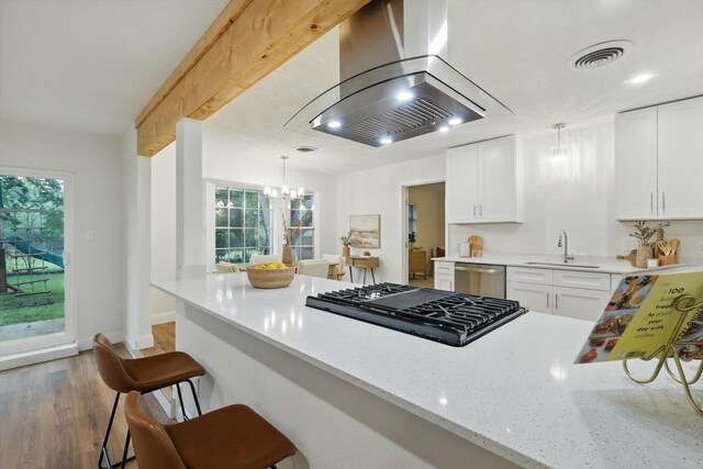 6304 Circleview Dr, Haltom City, TX 76180 - kitchen with wall chimney exhaust hood, a sink, dishwasher, black gas stovetop, and light wood-type flooring