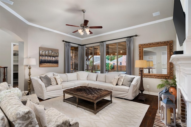 1229 Comanche Dr, Allen, TX 75013 - living area with a ceiling fan, arched walkways, wood finished floors, and ornamental molding